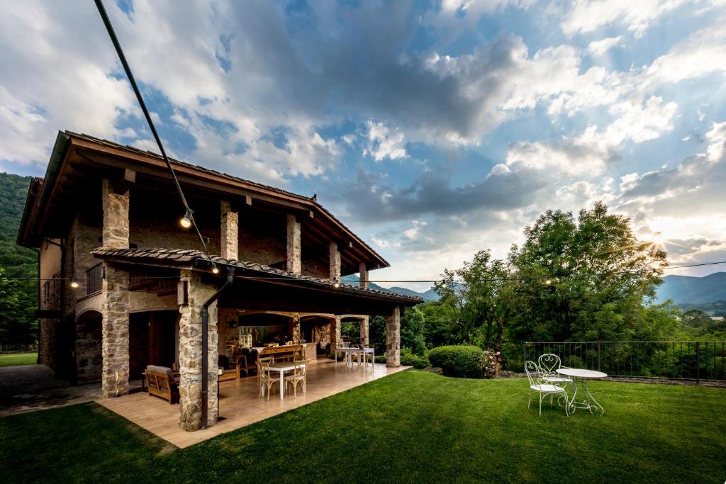 Hotéis em La Vall De Bianya com carregadores para carros elétricos